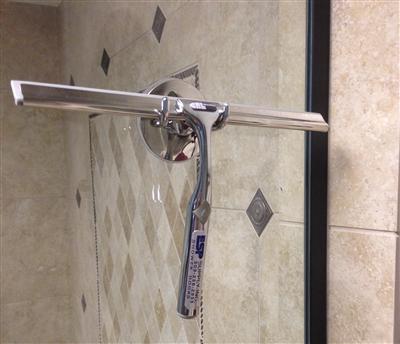 Use a squeegee to keep your glass shower clean